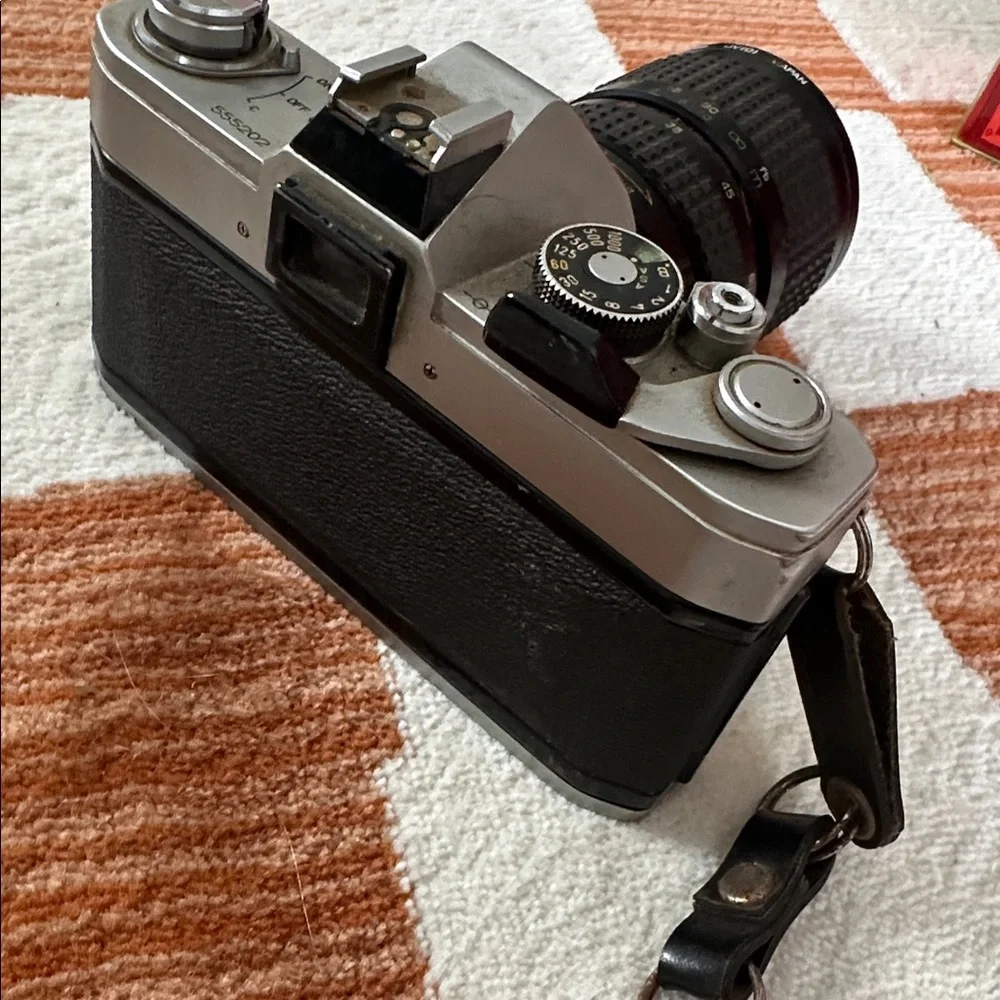 Canon FTb QL 35mm SLR film camera with 62mm Hoya lense